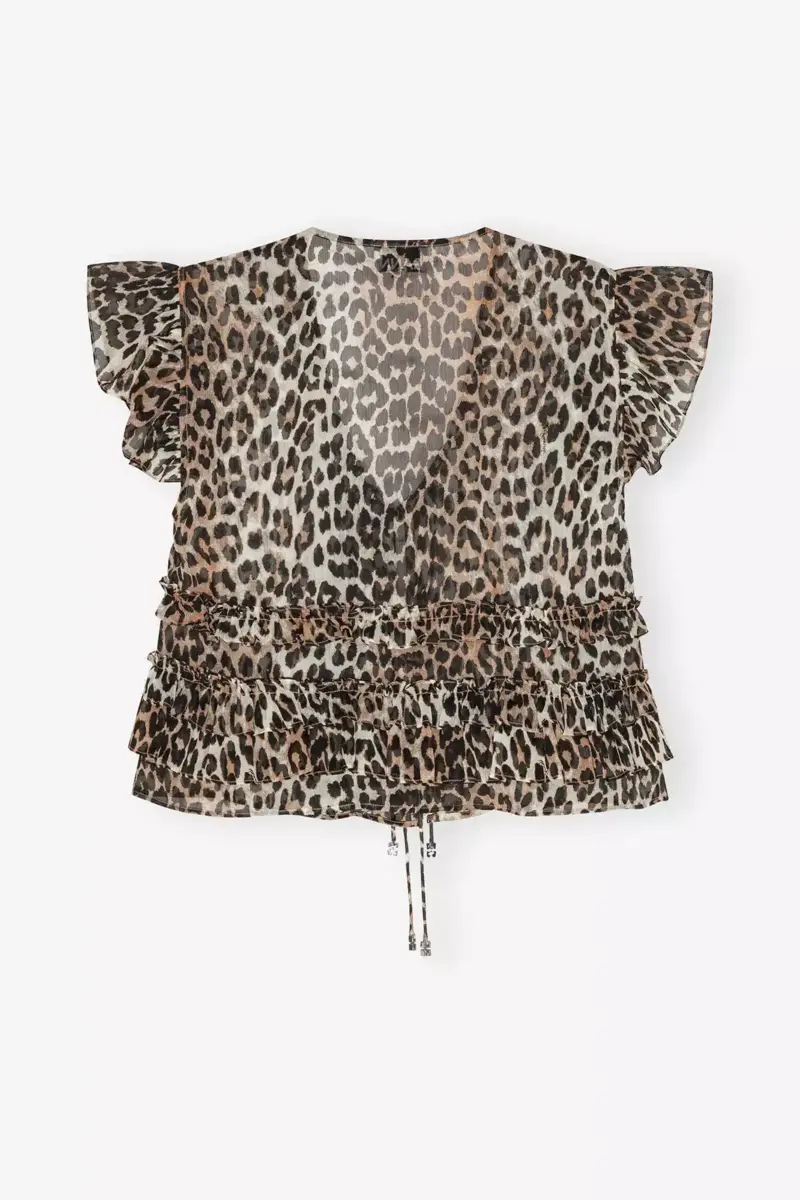 Blus i chiffong med leopardmönster och volanger