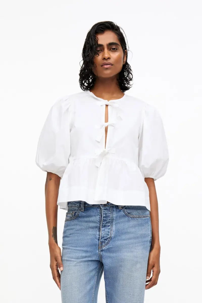 Bomullspoplinblus med peplum och knytband