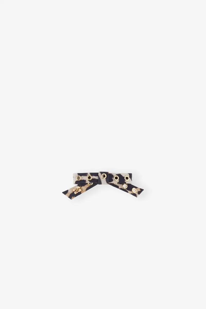 Hårspänne med leopardmönster och rosett