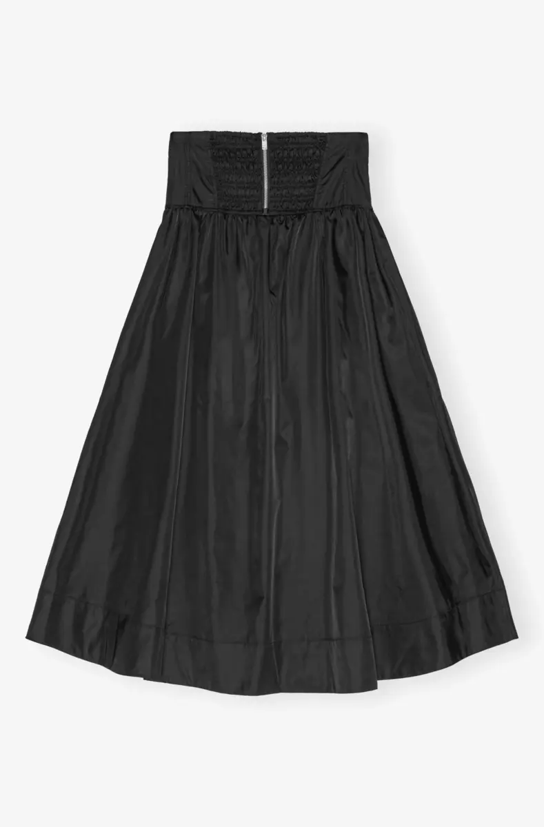 Lång kjol med fickor i svart duchesse-nylon Lång kjol med fickor i svart duchesse-nylon
