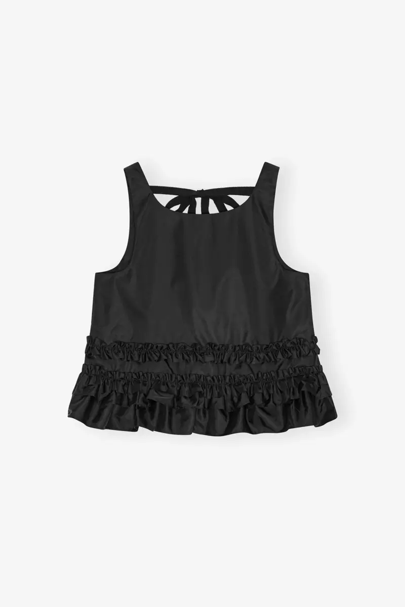 Svart topp i duchesse-nylon med volanger