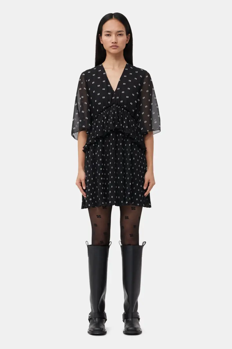 Svarta tights med fjärilsmönster